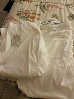 Victoria's Secret White
Rhinestone Bling Logo Pijama set only worn once